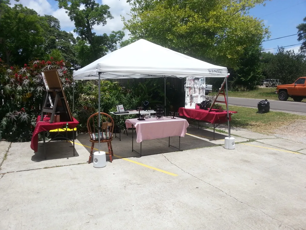 Outdoor booth being set up for craft show